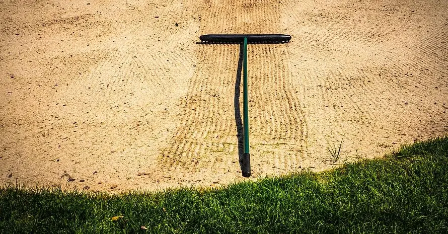 Lawn leveling rake