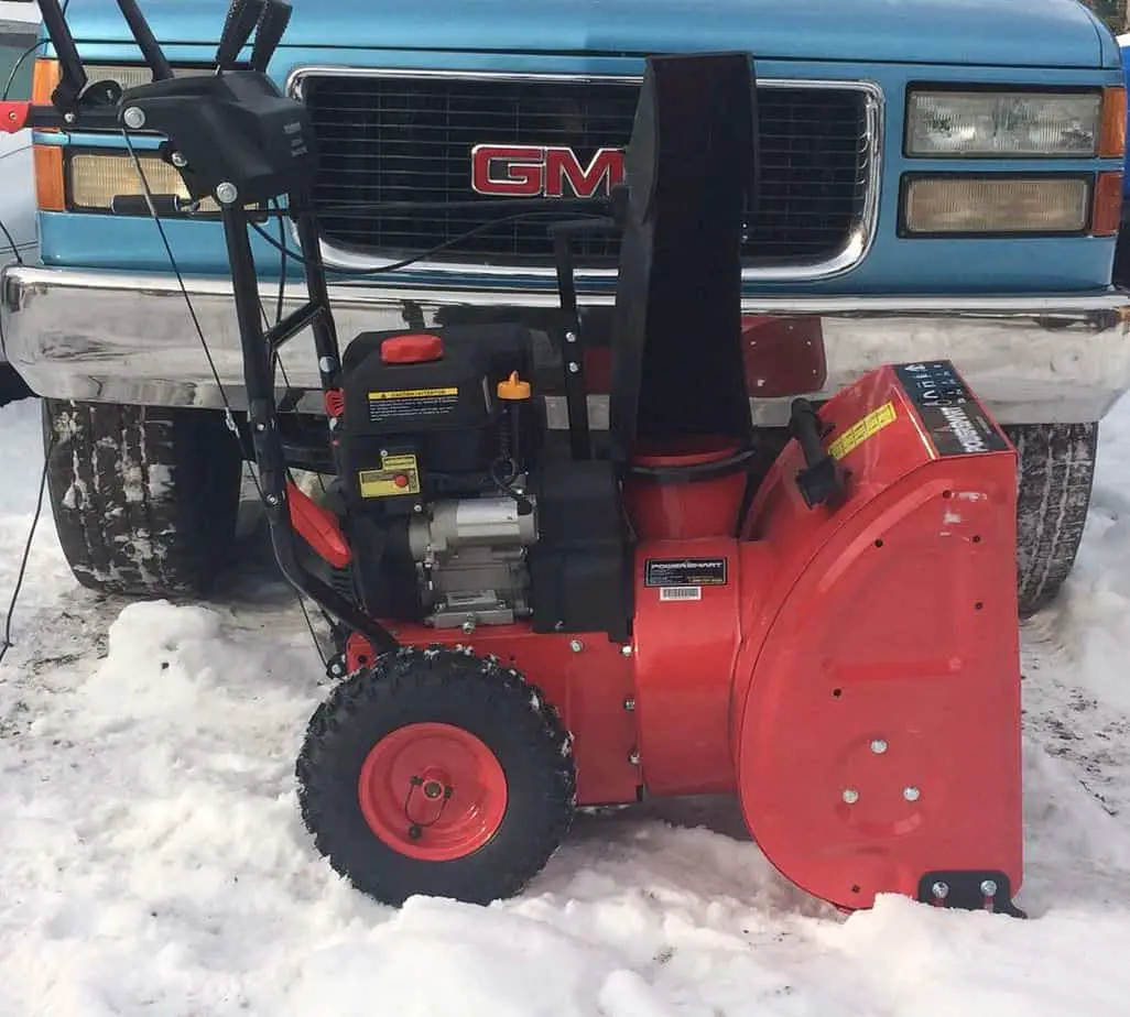 The PowerSmart Snow Blower is on the snow