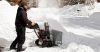 Man shoveling snow after a snowfall