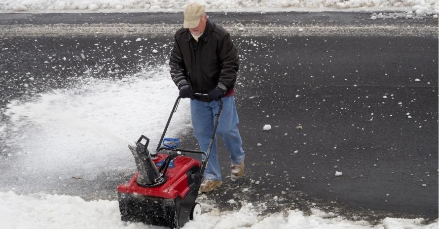 man shoveling snow