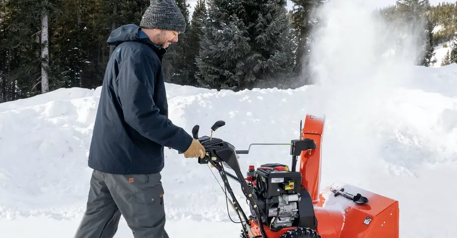Man Working With Snow Blower