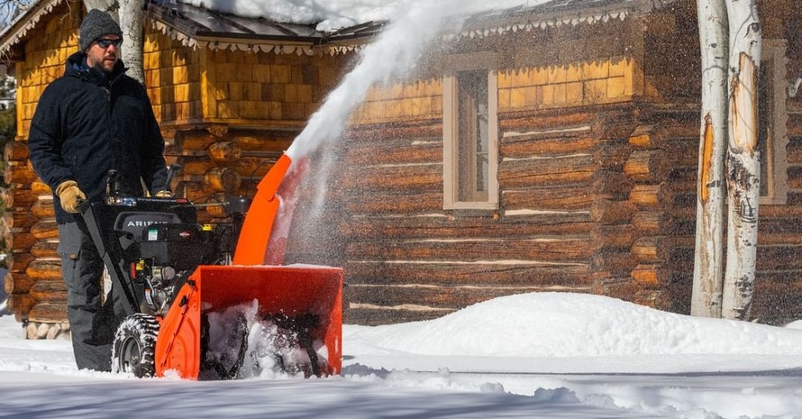 Man Driving Snow Blower