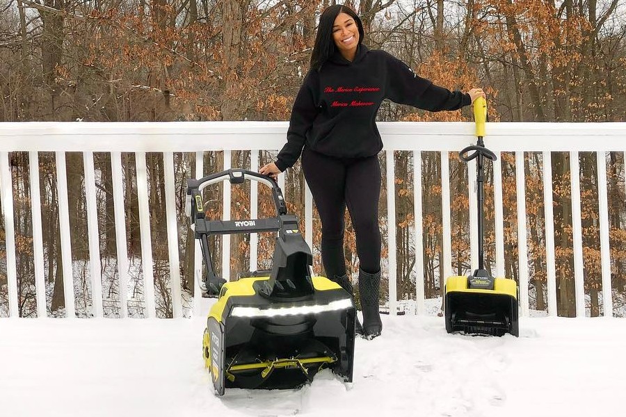 woman-and-electric-snow-blower