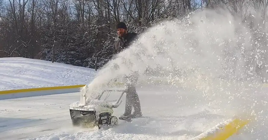 single-stage-snow-blower-and-man