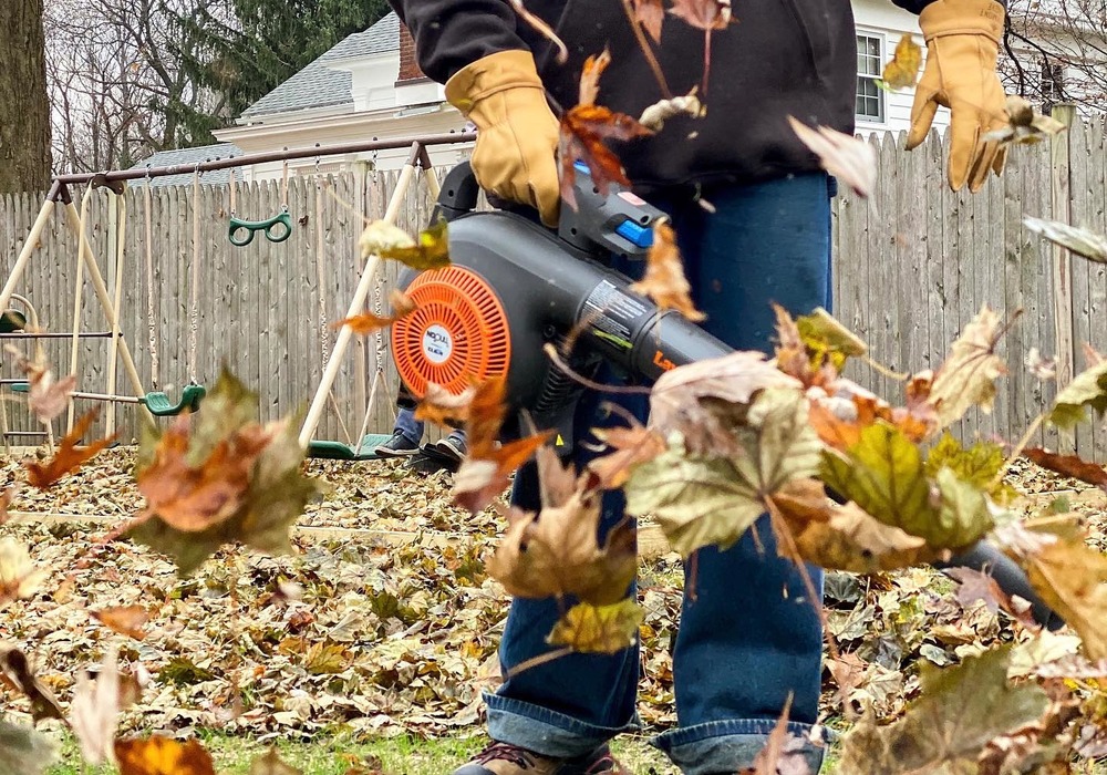 Man is using leaf blower